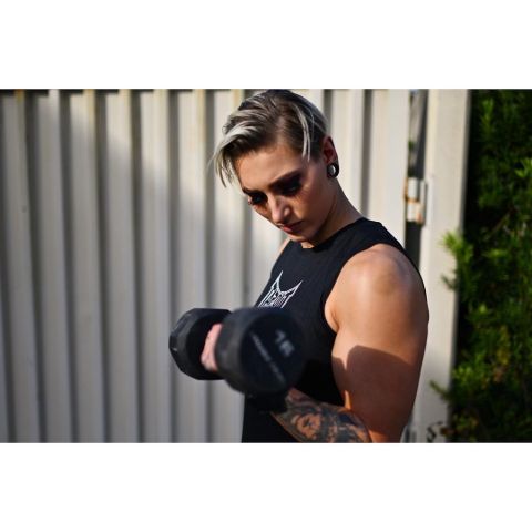 Rhea Ripley poses a picture while working out.